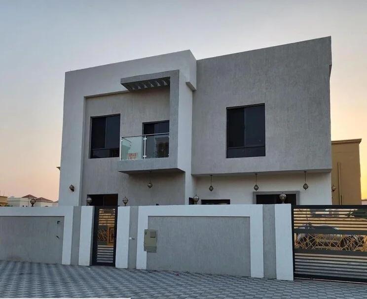 واجهة مبنى مكسوة بدهان البروفايل المخطط بجدة